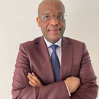Michel Sayumwe, Adm.A.